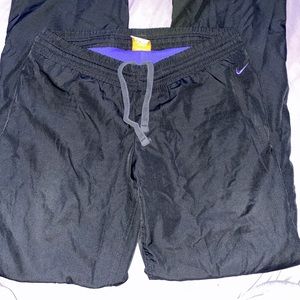 Nike track pants.